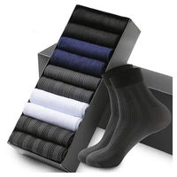 Vente en gros Coffret cadeau avec emballage Chaussettes d'affaires noires en coton avec motif design classique personnalisé pour hommes