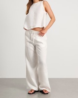 Nouvelle Collection 2025 – Ensemble Robe d'Été Décontractée 2 Pièces en Lin pour Femme : Haut Sans Manches et Jupe Longue Étages à Motif Uni – Vente Chaude OEM