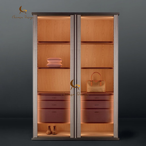 Minimalist Tall Sliding Built-in Ambient Lighting <b>Storage</b> Surfaces Leather Drawers Upscale Bedroom - Product Image 1