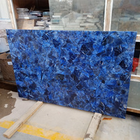 Panneau de marbre suspendu haut de gamme en gros dalle de pierres précieuses bleu jaspe sodalite bleu
