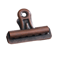 Pince à ressort en métal en fer créatif en gros pince à tête de taureau faite à la main en bronze vintage pour la papeterie et le bureau