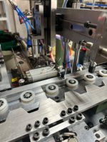 Machine d'assemblage automatique de roulements avec contrôle PLC pour la fabrication de roulements, alimentation des bagues intérieures, fournisseur