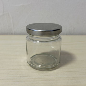 Piccolo Contenitore Magnetico Rotondo da 100 ml per Spezie, Barattolo in Vetro per Salsa con Tappo in Metallo Argentato per Miele, Marmellata e Conserve - Product Image 1