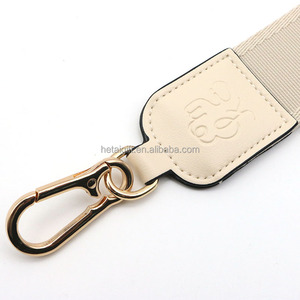 Logo personalizzato con cinturino Jacquard in pelle intrecciata portachiavi per borsa a tracolla