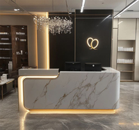 Comptoir de réception d'hôtel de luxe en marbre au design moderne à prix abordable, taille standard, comptoir de caisse exécutif en surface solide, garantie 10 ans