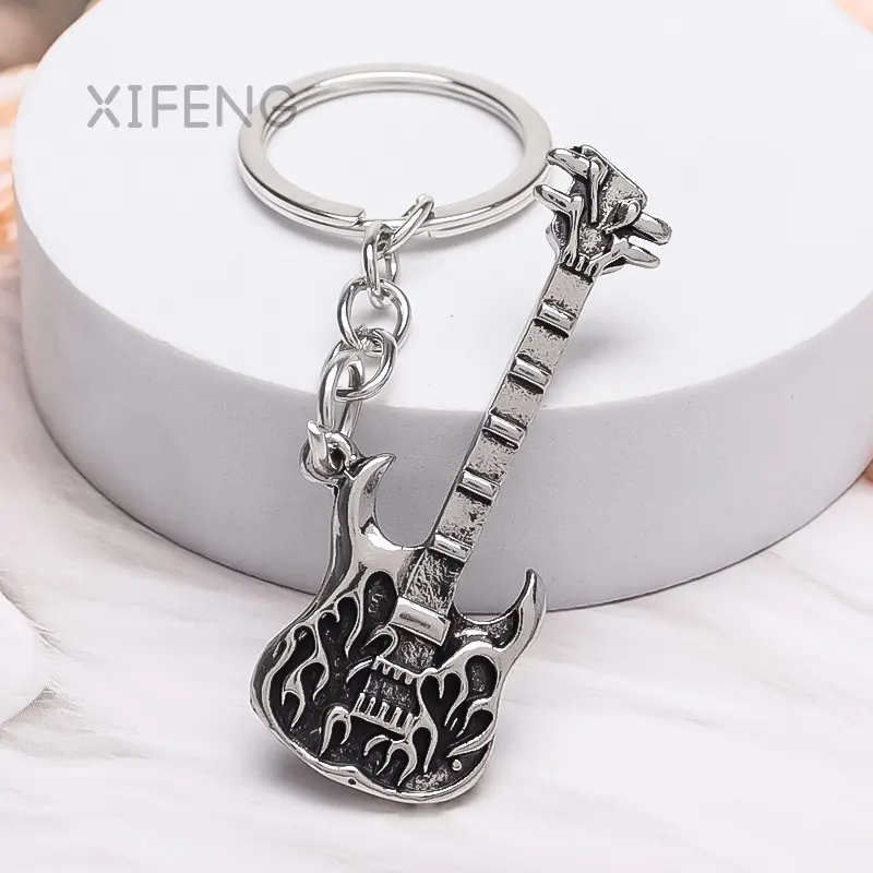 XIFENG Factory direct selling personalized creative guitar notes simple keychain Ukulele small guitar accessories keychain