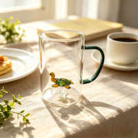 Tasses en verre résistant à la chaleur, tasse en verre transparent soufflé à la main avec une petite tortue 3D à l'intérieur, verre à boire avec poignée verte pour le café et l'eau