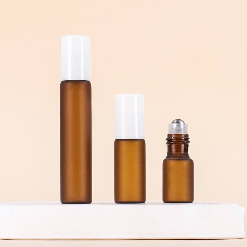 Matte amber bottle + Steel roller ball + Plastic white cap