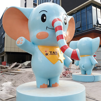 Sculpture géante en fibre de verre d'éléphant de dessin animé, mascotte mignonne, statue de personnage d'éléphant bleu pour centre commercial, place publique, parc d'attractions pour enfants