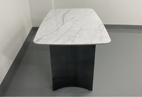 Table à manger rectangulaire moderne de luxe en pierre microcristalline avec base en acier inoxydable noir titane