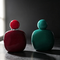Flacon de parfum de luxe en verre forme galet 30ml 50ml 100ml avec capuchon sphérique couleur personnalisée vide rechargeable vaporisateur de voyage