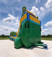 Toboggan aquatique gonflable double piste Tiki Typhoon, style Tiki tropical, avec piscine, pour location événementielle
