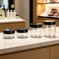 Pot en plastique PET transparent de qualité alimentaire avec couvercle noir pour beurre corporel, bonbons, gommage corporel, crème de soin de la peau