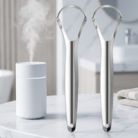 Nettoyeur de langue double action en acier inoxydable
