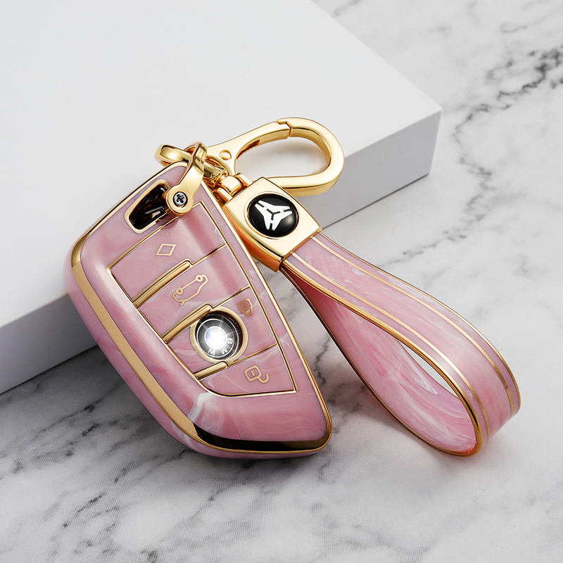 Cache bouton 4 boutons rose + porte-clés TPU