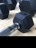 Grosir Cina produsen kustom berat bebas Gym10-100 LB 1-50kg Set logam menangani besi cor karet Hex Hexagon Dumbbell