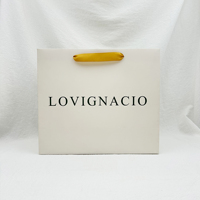 Bolsa de papel de compras reutilizable con impresión de logotipo personalizado de marca de lujo reciclable con asa de cinta