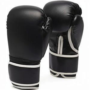 Gants de boxe Fairtex noirs et orange personnalisés, 100 % cuir véritable, avec sangle Fairtex, pour entraînement de boxe et salle de sport - Product Image 1