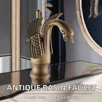 Robinet de lavabo européen antique tout en cuivre mitigeurs d'eau chaude et froide robinets de lavabo design animal en laiton céramique