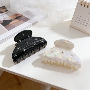 Pince à cheveux Lumiara de luxe avec strass étoilés - Épingle à cheveux haut de gamme scintillante pour coiffures mi-attachées et queues de cheval hautes - Product Image 3