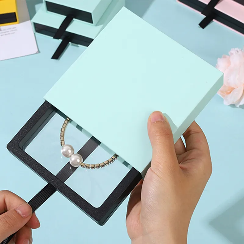 Transparante Pe Film Plastic 3d Zwevend Frame Sieraden Display Houder Doos Verpakking Met Papier Lade Doos