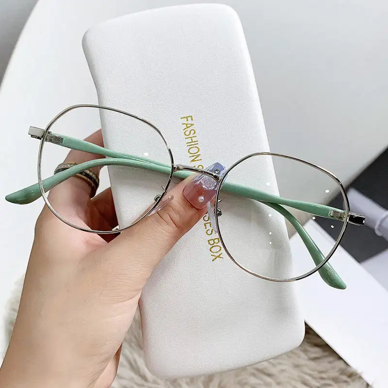 กรอบแว่นกลมสีฟ้าป้องกันแสงกรอบแว่นสายตาแบบออปติคัลใช้ได้ทั้งชายและหญิงกรอบโลหะทันสมัยสุดหรู