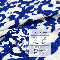 Tissu imprimé en crêpe tricoté artistique: 97% polyester + 3% élasthanne, motifs bleu-blanc audacieux