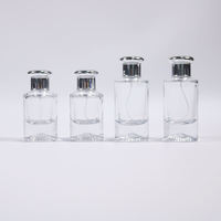 Botol Parfum Kaca Silinder Bening 30ml 50ml Mewah yang Dapat Disesuaikan, Alas Tebal, Pompa Semprot, Sablon, Lapisan Frost Matte