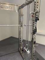 Rack de musculation multifonctionnel en acier inoxydable avec Smith Machine, poulie, Pec Fly et rack à squats pour usage commercial en salle de sport