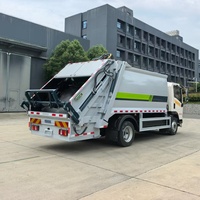Camion compacteur de déchets Sinotruk HOWO 4x2, véhicule à énergie nouvelle, 10,5 m³, chargement arrière, pour la collecte des déchets