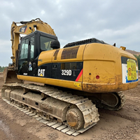 Excavatrice d'occasion Caterpillar 329DL, 29 tonnes, sur chenilles, avec godet hydraulique et attache rapide pour travaux de terrassement et de construction