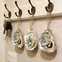 Ensemble de 3 ornements en coquille d'huître avec étoiles de mer et perles, faits à la main avec des coquillages naturels et une corde dorée