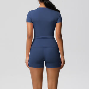 Conjunto de yoga sin costuras Top de manga corta con pantalones cortos de motorista de control de barriga Ropa de gimnasio de secado rápido para mujer - Product Image 2