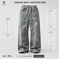 Pantalon de survêtement unisexe personnalisé 100% coton gris chiné, style urbain, avec taille élastiquée froncée, cordon de serrage à gros pompons et effet multi-déchiré