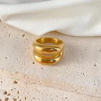 Bague élégante eManco à double boucle en acier inoxydable plaqué or PVD - Bijou délicat hypoallergénique sans nickel pour femme