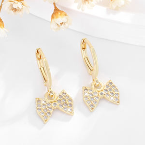 2025 vente en gros de haute qualité nœud papillon mode 14k cuivre plaqué or incrusté Zircon tenue quotidienne boucles d'oreilles en laiton bijoux pour femmes - Product Image 3