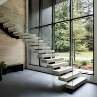 Escalier préfabriqué à poutre centrale simple en forme de L, sur mesure pour appartement et loft
