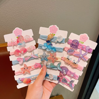 Neue Kinder-Haarschleifen im süßen Ozean-Stil: Cartoon-Meerjungfrau, Muschel, Seestern – Baby-Haaraccessoires für Partys