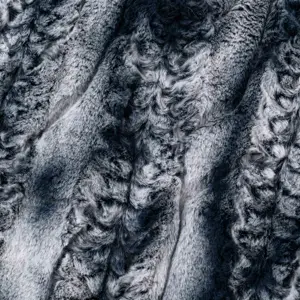 Tela de piel sintética de conejo sin desprendimiento en relieve suave cepillado Popular para manta de ropa personalizada al por mayor tela de piel sintética