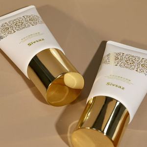 Tube cosmétique blanc avec capuchon électro-plaqué or métallisé pour masque facial peel-off - Product Image 3