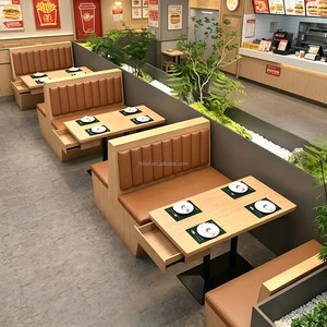 Banqueta Curva de Pared en Tono Claro, Tapicería Naranja con Mechones Verticales, Mesa Redonda, Proyectos de Renovación de Cantinas de Comida Rápida - Product Image 4