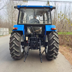 Kabin ile kullanılmış <span class=keywords><strong>New</strong></span> Holland SNH904 traktör 4WD ve tarım ekipmanları 90HP traktör - Product Image 3