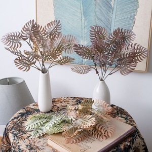 CallaFloral – Lots de feuilles de Monstera en plastique jaune foncé, plantes artificielles pour la décoration intérieure et les arrangements de mariage - Product Image 1