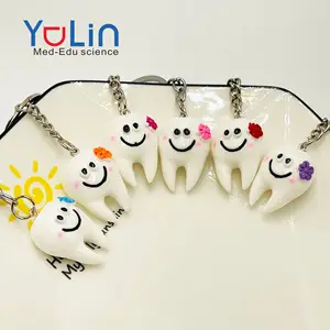 Creative simulation smiling face tooth keychain resin accessories personalized gift bag pendant activities gift wholesale