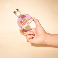 Bouteille de diffuseur d'arôme en verre vide en demi-cercle transparent créatif de 30 ml 50 ml 100 ml avec bouchon d'étanchéité pour l'aromathérapie