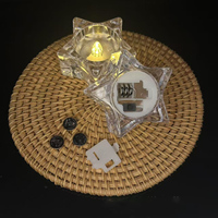 Vente en gros de bougies LED en forme d'étoile transparentes en plastique, lumière chaude, fonctionnant sur piles, finition brillante, décoration de table de mariage