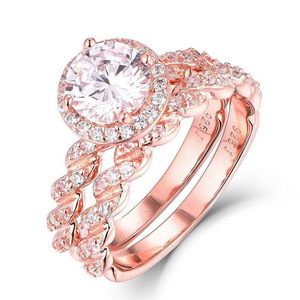 Anello a fascia intrecciata da donna, tono oro rosa, gioiello minimalista alla moda - Product Image 1