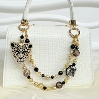 Cadena para teléfono móvil con forma de corazón, con perlas y estampado de leopardo, brillante y con diamantes, la más vendida, colgante artesanal para bolso