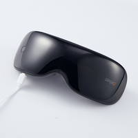 Masque vibrant relaxant à faible bruit masseur de soins oculaires avec machine de soulagement du stress musical pour les cernes