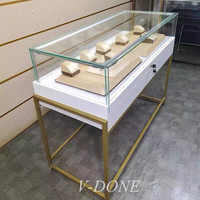 Vitrine de conception intérieure de bijouterie, vitrine en verre, armoire à bijoux en acier inoxydable, présentoir